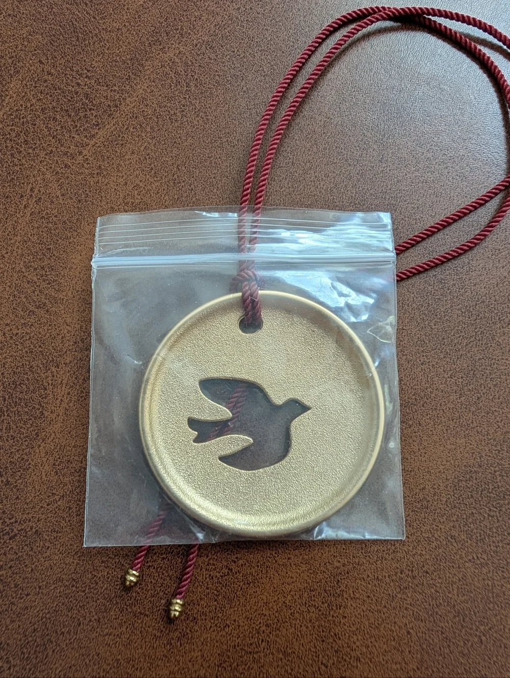 David Yurman Gold Dove Pendant with Red Cord
